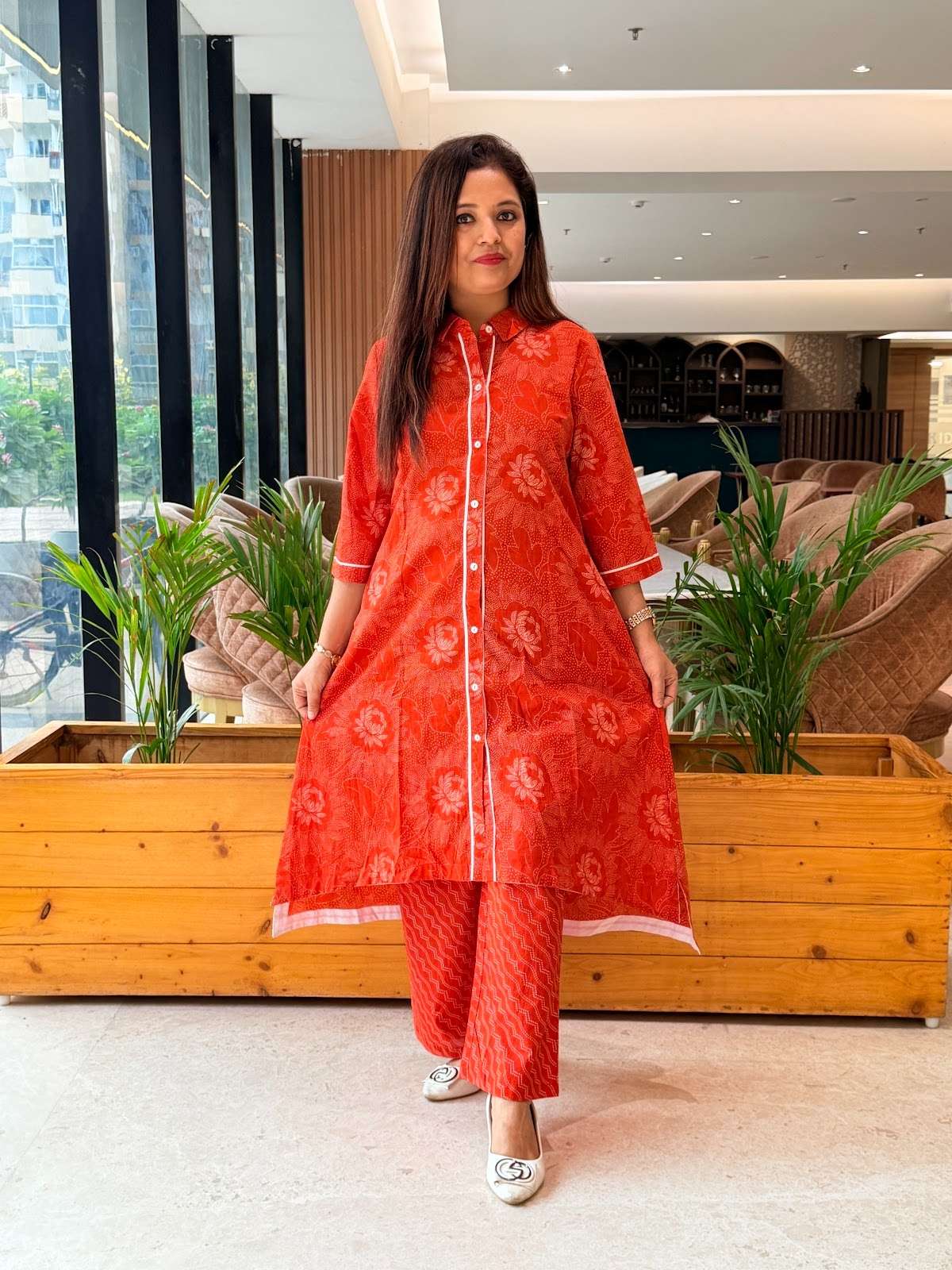 Cotton pant set with button detailing and high low pattern with flared plazzo