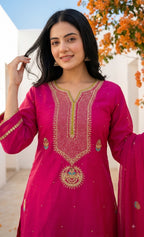 Vibrant pink ethnic sharara set intricate gold zari embroidery