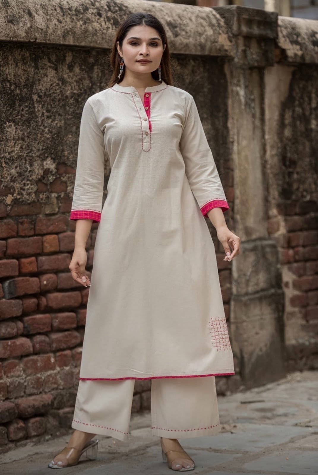 Flex cotton cream and pink embroidered kurta pant set features a stylish straight fit