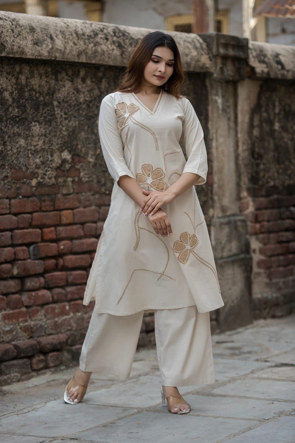 Khadi cotton kurta pant set with unique floral thread work aling with jute applique wotk on kurta