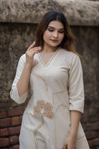 Khadi cotton kurta pant set with unique floral thread work aling with jute applique wotk on kurta