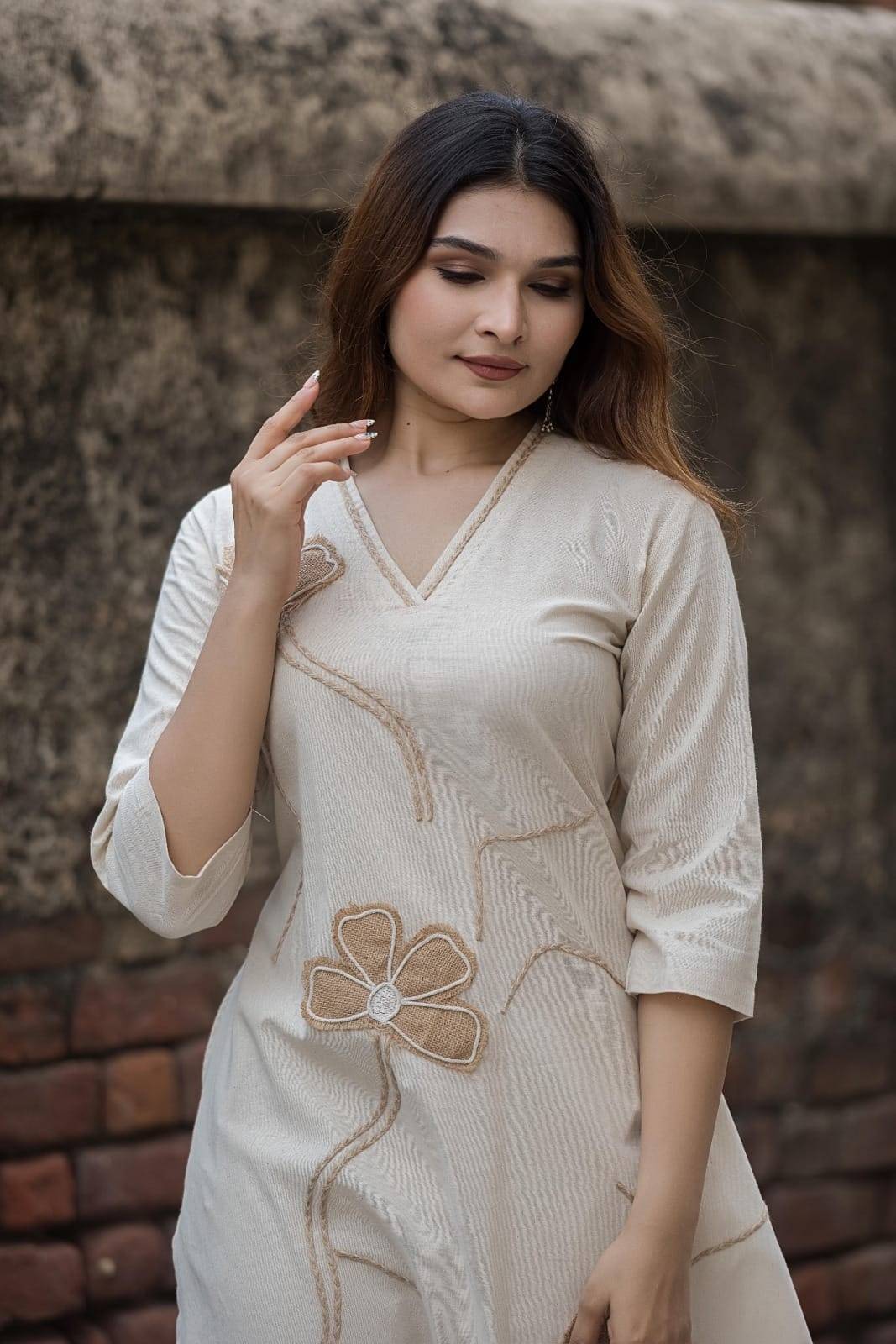 Khadi cotton kurta pant set with unique floral thread work aling with jute applique wotk on kurta