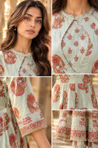 Light green floral-printed Angrakha Anarkali gown with a layered and flared design