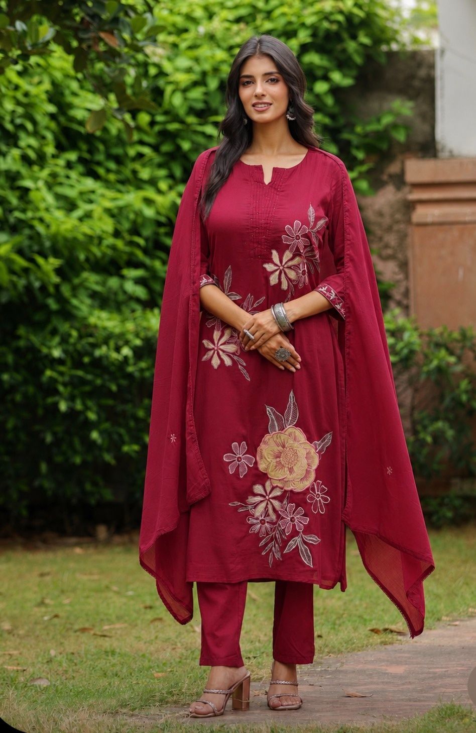 Maroon cotton suit set with embroidered  delicate floral thread work, matching trousers, and a coordinating draped dupatta
