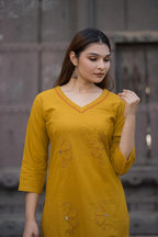Mustard yellow flex cotton suit set with mirror and embroidery detailing