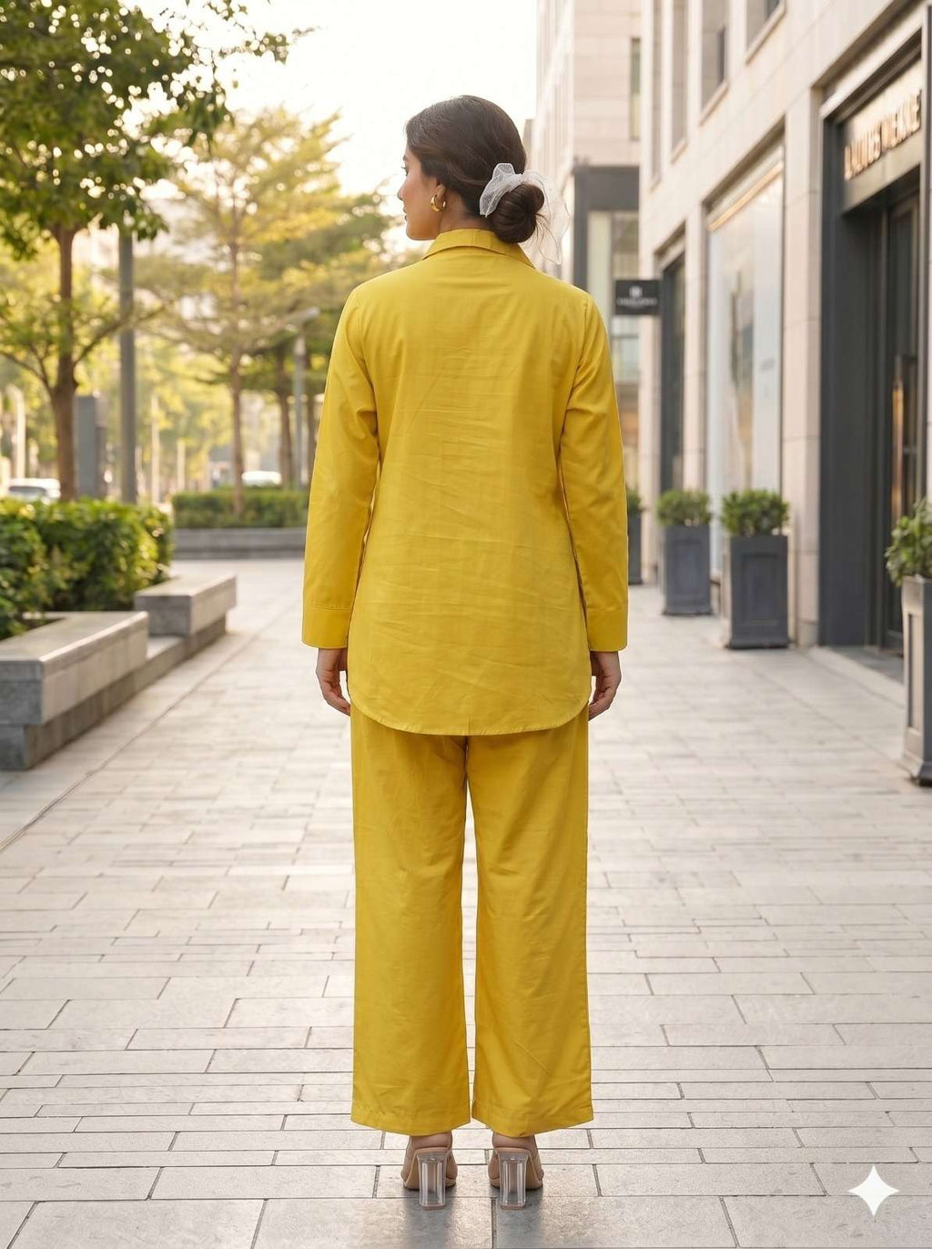 Mustard Yellow Pure cotton co-ord set featuring white appliqué clover or shamrock-style floral details along the front of the tunic and pants