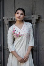Off white Anarkali  floral-embroidered Angrakha neckline and mirror-work details with bottom