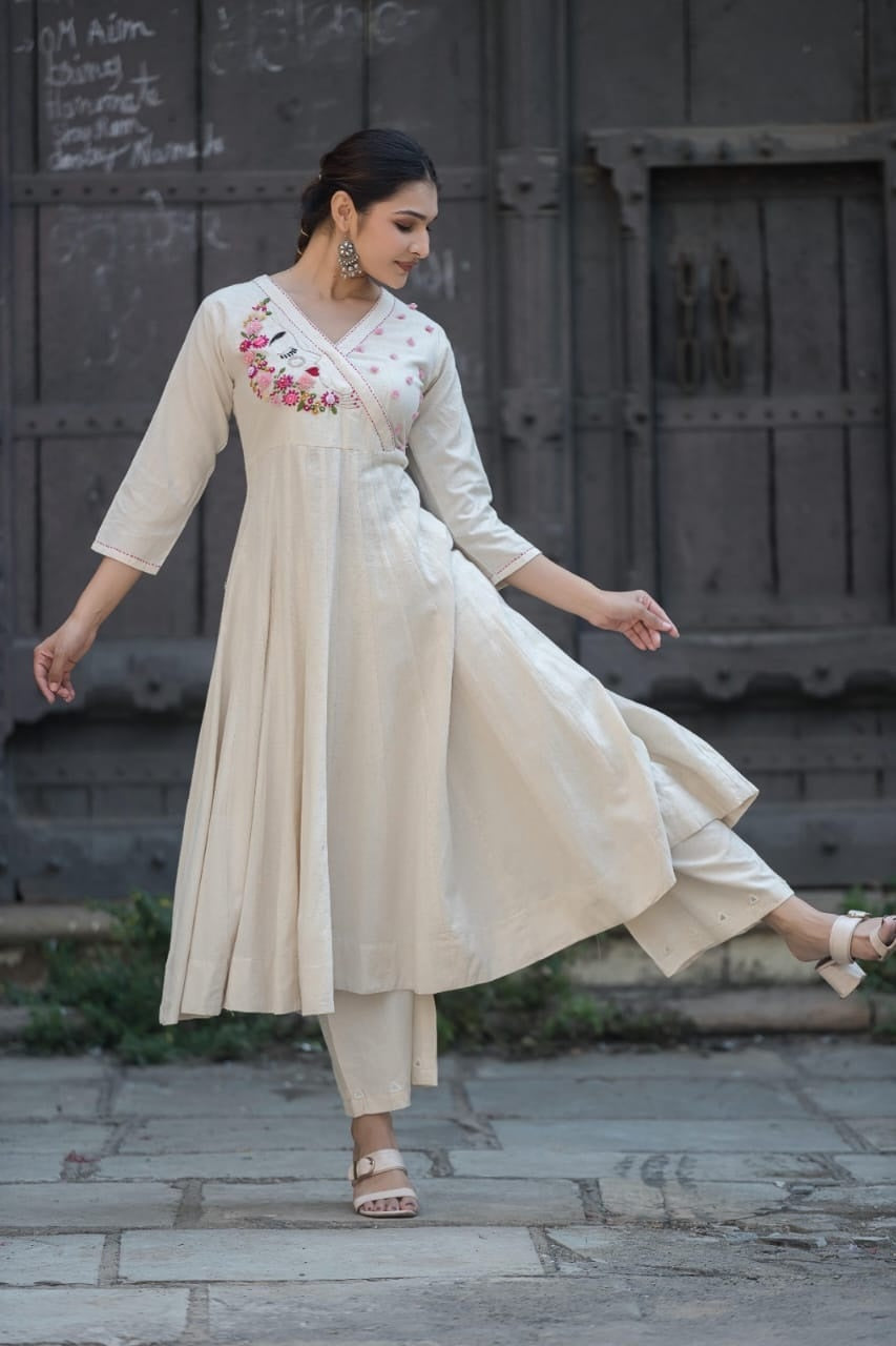Off white Anarkali  floral-embroidered Angrakha neckline and mirror-work details with bottom