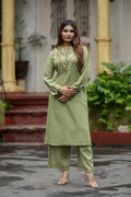 Cotton Shamrey pant set in Parrot Green Colour with gold metal coin embellishments broad yoke with coin detailing on bottom