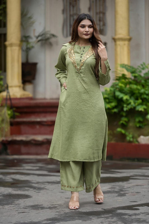 Cotton Shamrey pant set in Parrot Green Colour with gold metal coin embellishments broad yoke with coin detailing on bottom