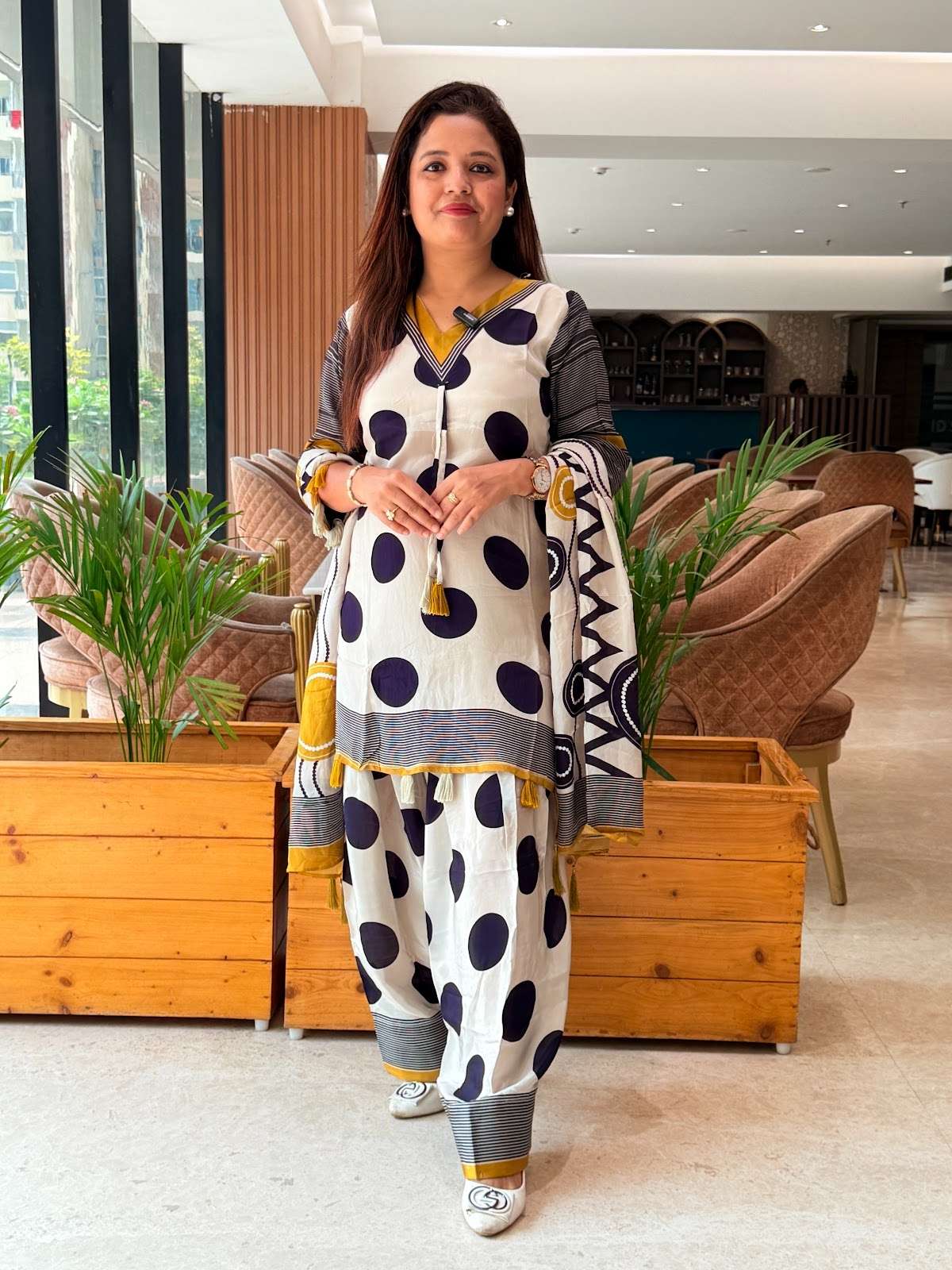 Pure white muslin kurta and farshi salwar set featuring large black polka dots, yellow accents, and a matching printed dupatta