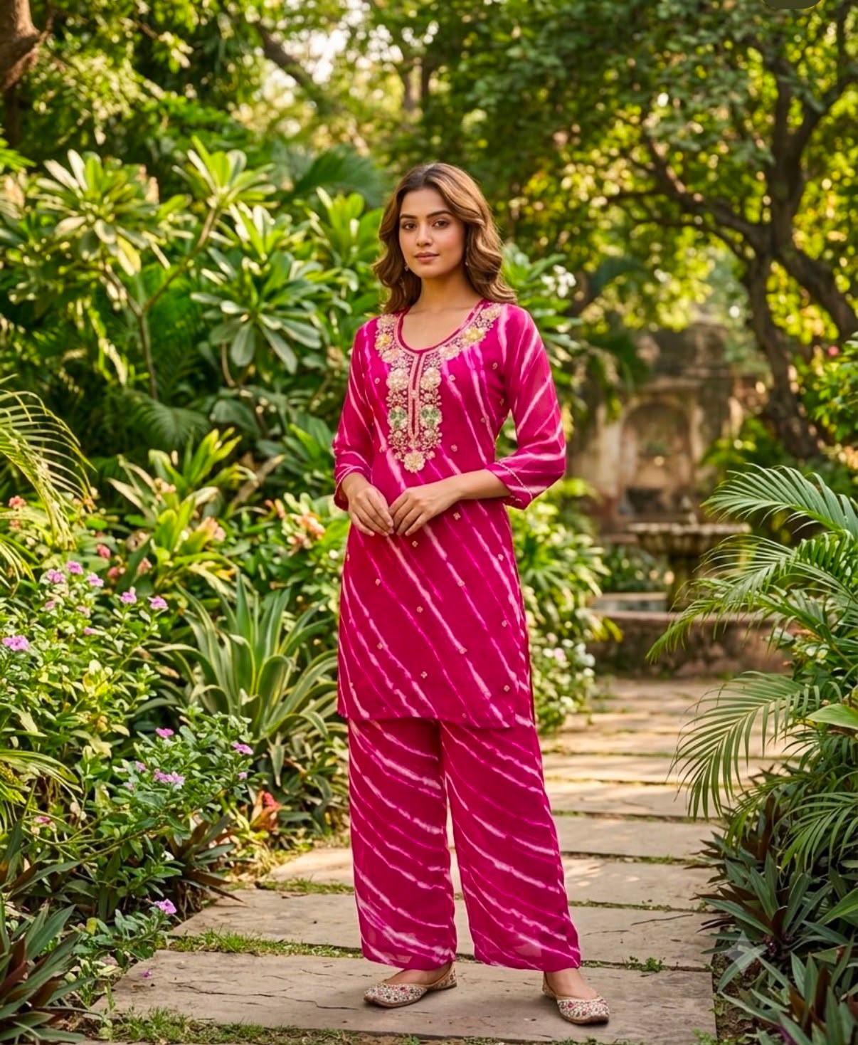 Rani Pink leheriya print georgette co-ord set featuring delicate floral embroidery on the neckline with cotton lining