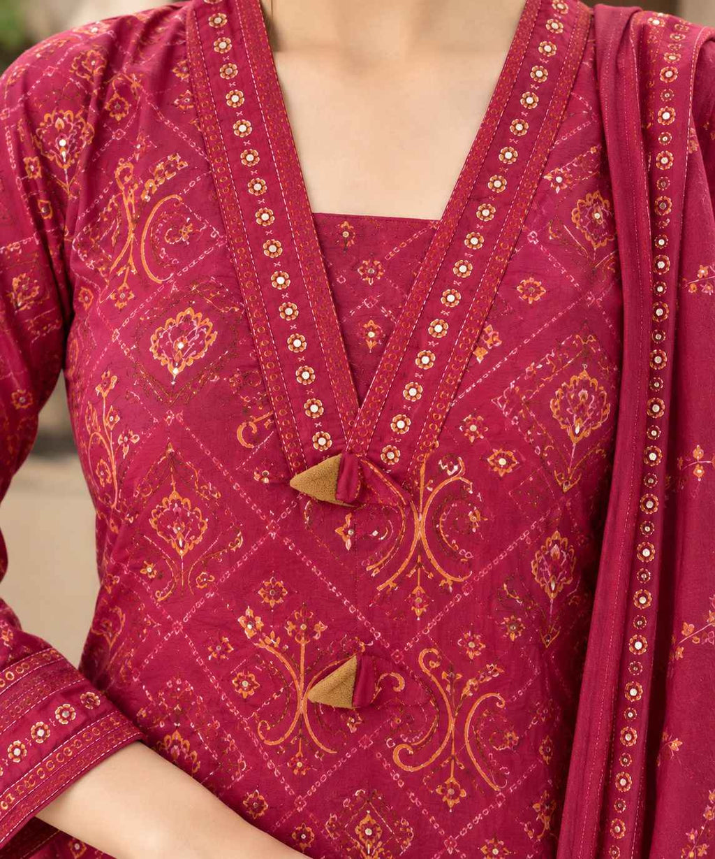 Vibrant maroon bandhani print short kurta set with farshi salwar and a matching printed dupatta