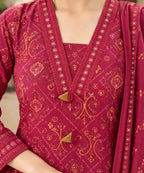 Vibrant maroon bandhani print short kurta set with farshi salwar and a matching printed dupatta